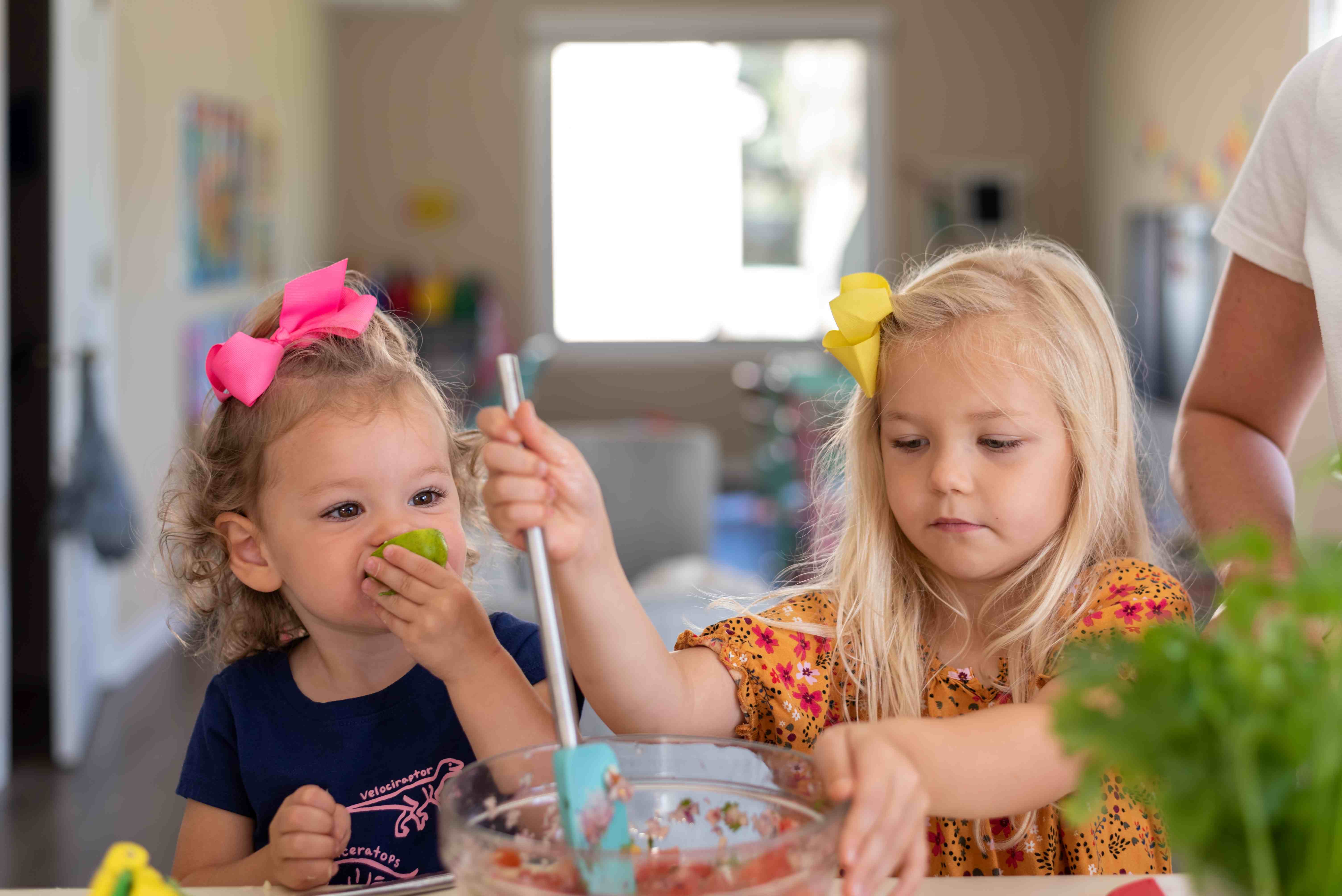 children preparing snacks